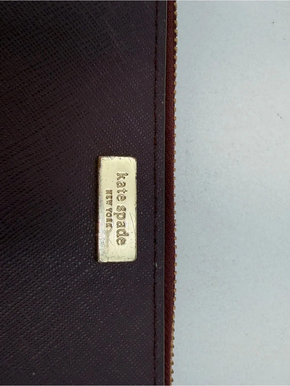 kate spade Zip-Around Wallet in Burgundy with Gold Hardware
